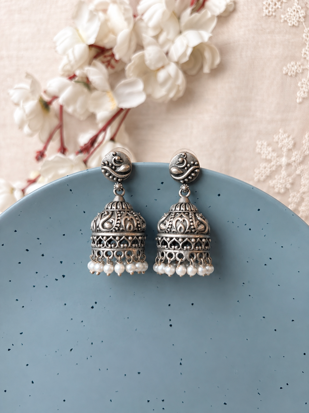 Angakh Oxidized Silver Peacock Motif Dome Jhumka Earrings